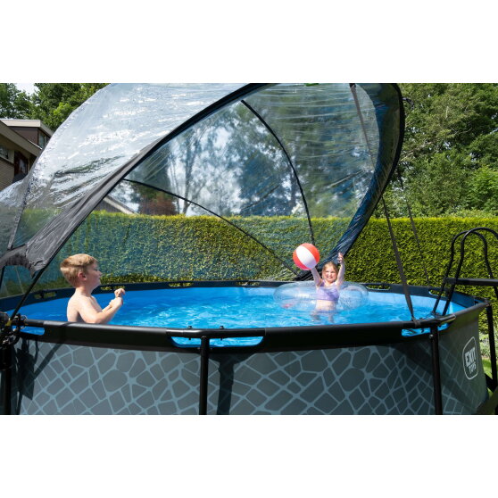 Piscina EXIT Stone &oslash;427x122cm con bomba de filtrado de arena y c&uacute;pula y bomba de calor, color gris